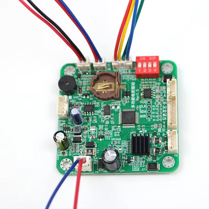 ST005 stepper motor controller board with multi-color wiring connections showing RS485 port, DIP switch and signal interfaces
