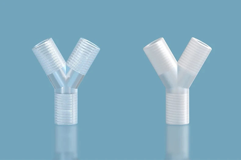 White plastic Y-shaped three-way thread connector, pair view on teal background
