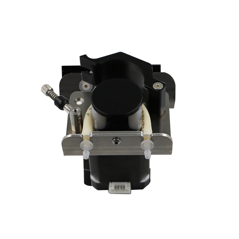 Top view of BPB high accuracy peristaltic pump head with spring pressure block and tube clamp mechanism
